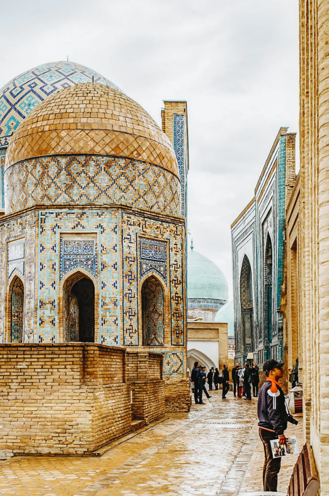 Mausoleums at Shah-i-Zinda complex in Samarkand with blue and gold tiled domes